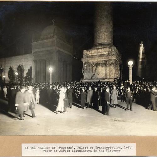 At the "Column of Progress." Palace of Transportation, left. Tower of Jewels illuminated in the Distance