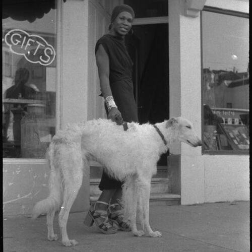 Sylvester outside with dog "Nikita" in front of the flat at 2329 Market Street