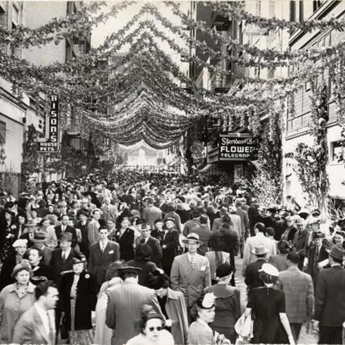 [Large crowd of people attending the Maiden Lane spring festival]