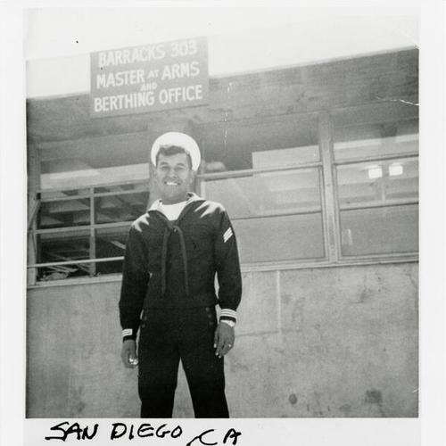 [Man posing in his Navy uniform at Coronado Navel Station]
