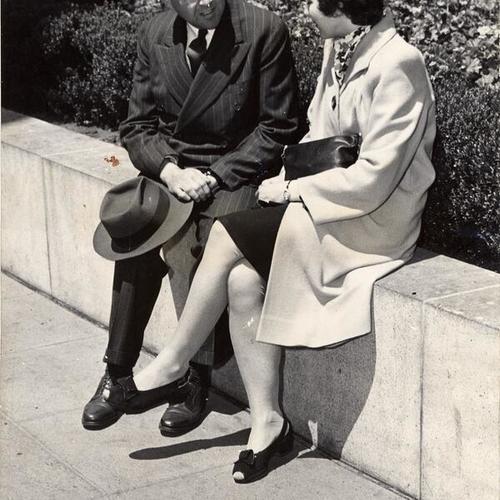 [Lieutenant Frank McConnell talking with Lois Thomas]