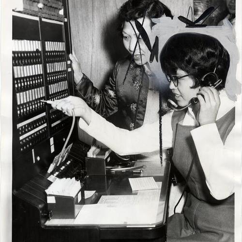 [Nora E. Wong and Pamela Wong at the Chinese Answering Service on Grant Avenue in Chinatown]