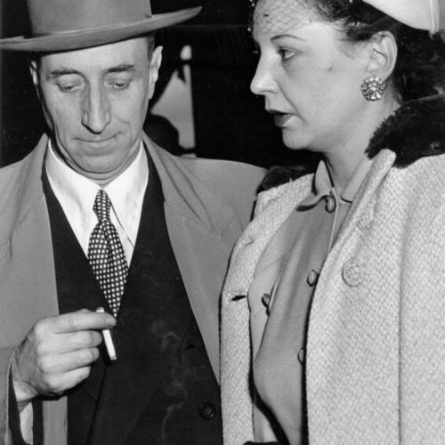 [Harry Bridges, West Coast longshore leader, and his wife leave the Postoffice Building where yesterday Bridges' appeal from a conspiracy conviction was argued before the U.S. Circuit Court of Appeals]
