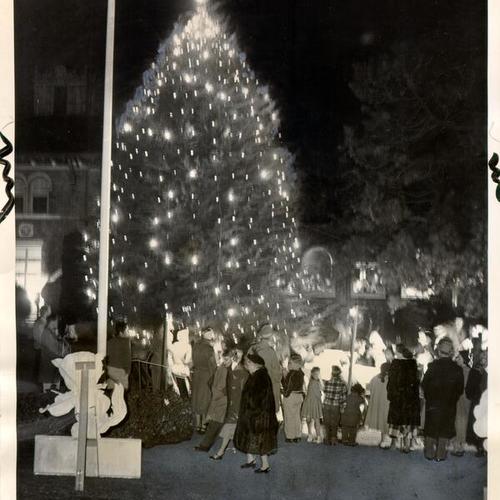 [Lighting of Christmas tree outside the Shriners' Hospital for Crippled Children]