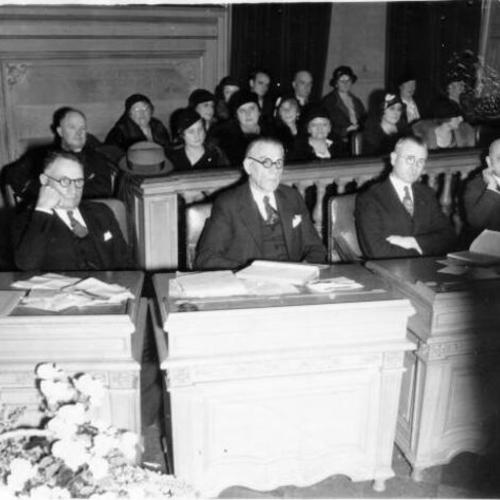 [Supervisors Ratto, Uhl and Schmidt at a board meeting]