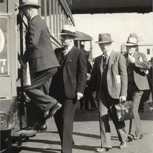 [Passengers boarding a streetcar during general strike]