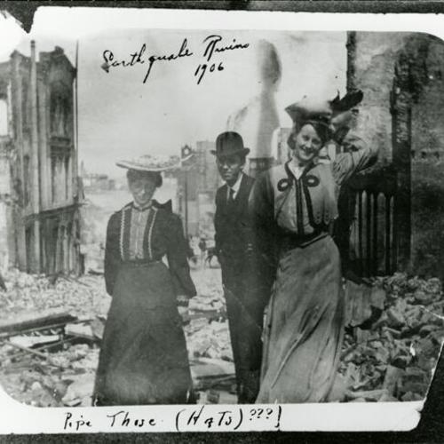 [Jean's parents wedding photo of Grace Alice, Clinton Hollis and maid of honor Mary standing in 1906 earthquake rubble possibly on Post Street]