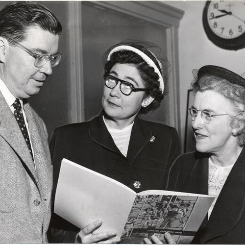 [Dean Leo F. Cain and Florence G. Henderson of San Francisco State College posing with Georgie Lee Abel of the American Foundation for the Blind]