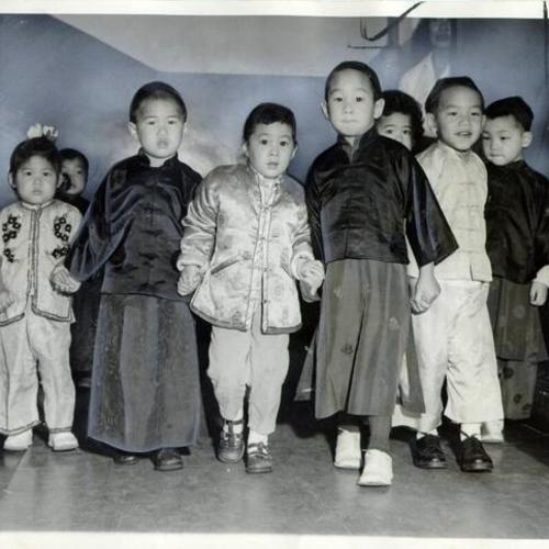 [Group of children posing for a photo on Chinese New Year]