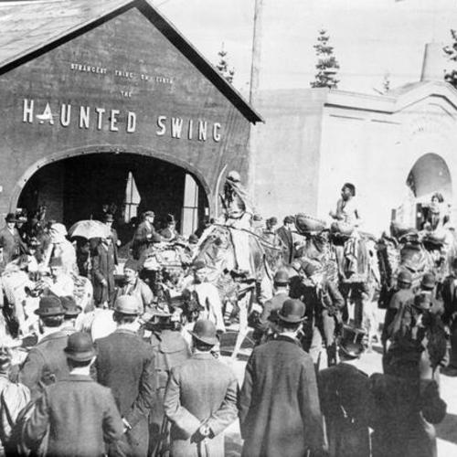 [Musicians performing outside the "Haunted Swing" at the Midwinter Fair in Golden Gate Park]