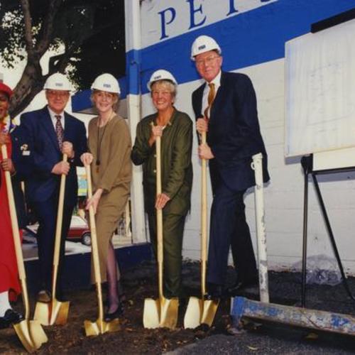 Five people with gold shovels at SPCA ground breaking ceremony