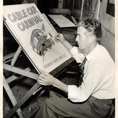 [Milton Snyder painting a poster for a Cable Car Carnival to be held at the Fairmont Hotel]