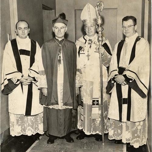 [Father Carroll O'Sullivan, Bishop Thomas K. Gorman, Archbishop John J. Mitty and Father William Monihan at the University of San Francisco]