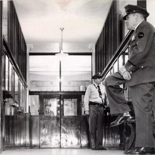 [Three guards at the Federal Reserve Bank of San Francisco]