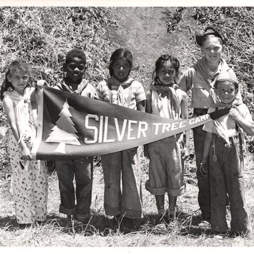 [Children holding flag of Silver Tree Camp]
