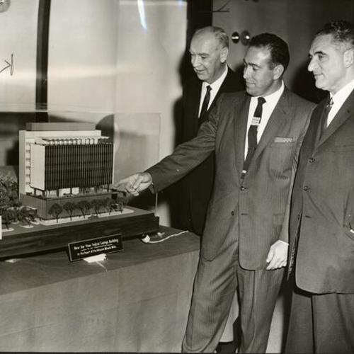 [Frank Goni showing model of Bay View Federal Savings Bank to Congressman Jack Shelley and Mayor George Christopher]