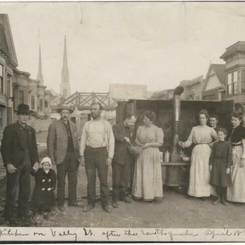 People standing at outdoor kitchen on Valley street after the 1906 earthquake and fire