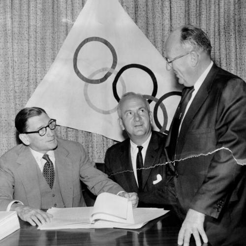 [Charles Blyth signs the first construction contract for the site of the 1960 Winter Olympics]