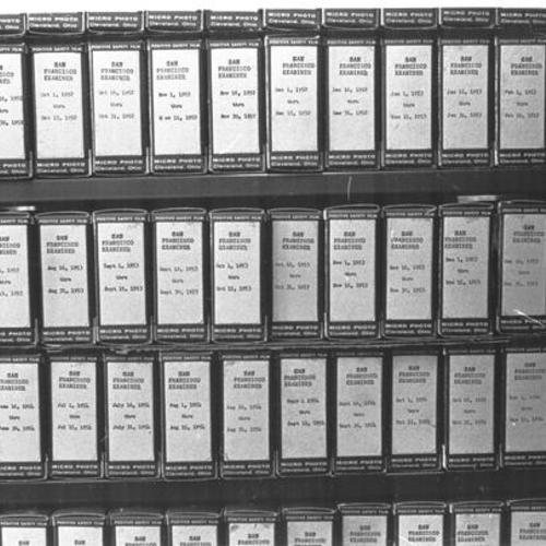 [View of microfilms on shelves at Main Library]
