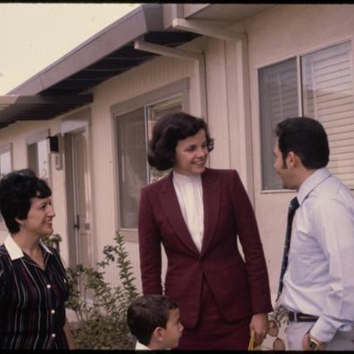 Mayor Dianne Feinstein greets family at Mariners Village condos