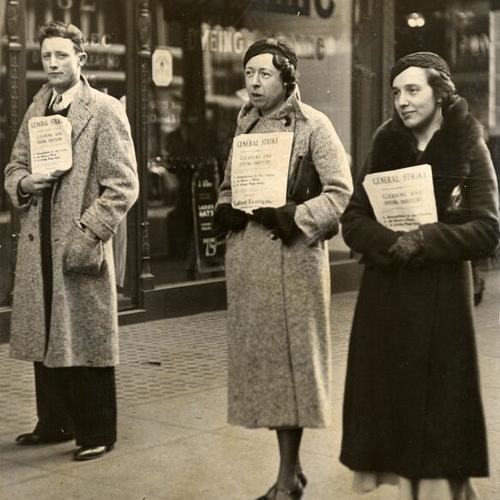 [Three people holding leaflets during general strike of 1934]