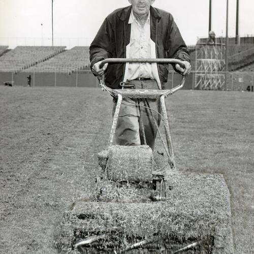 [Harvey Sparge manually mowing the field at Candlestick Park]