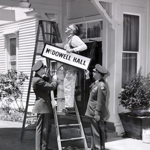Hanging name sign in honor of the first Army occupant of Fort Mason, Maj. Gen. Irvin McDowell]