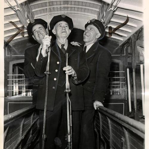 [James L. Buskirk, Harry Bishop and Thomas Hutchings - participants in a cable car bell ringing contest]
