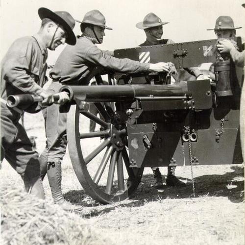[Soldiers loading a cannon during Army Day]