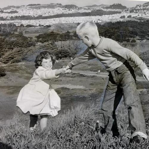 [Danny Town and Patti Keate playing on the sand dunes of Fort Funston] 