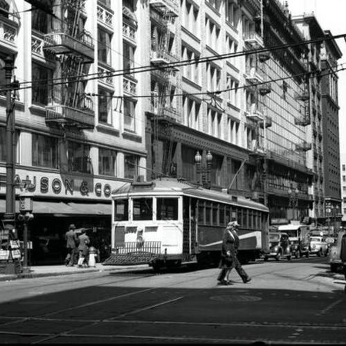 [Sutter east of Kearny looking east at outbound #4 line car 234 passing Pauson & Co. store]