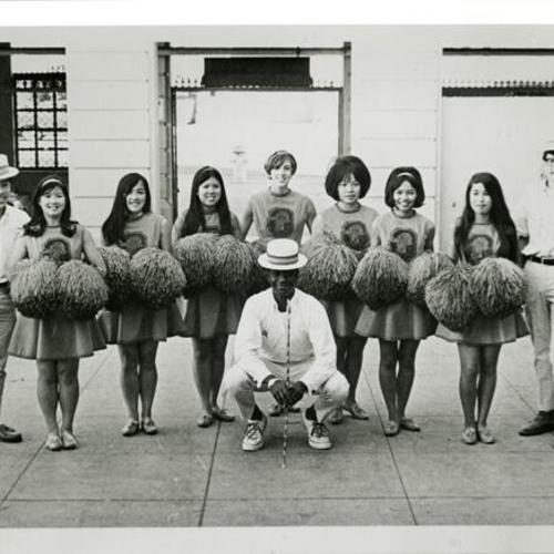 [Cheerleaders of Galileo High School and Paul, center, in 1967]