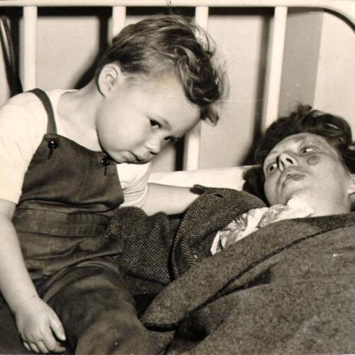 [Mrs. Florence Cardoza, with her three year old son Ronald, injured when a cable car jumped it's track and plunged down a Washington Street hill]
