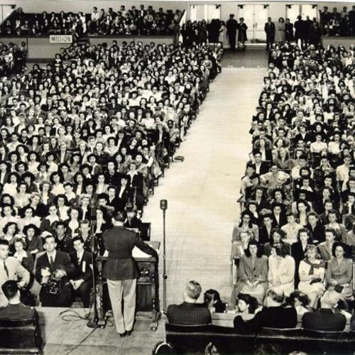 [General Carlos P. Romulo of the Philippine Commonwealth addressing an audience of Bay area high school students at the Civic Auditorium]
