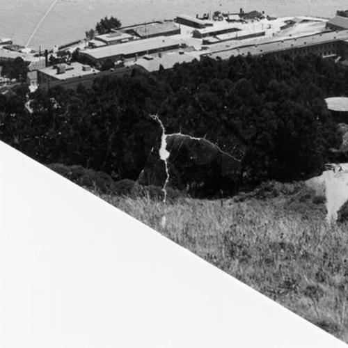 [Aerial view of Angel Island buildings and dock area]