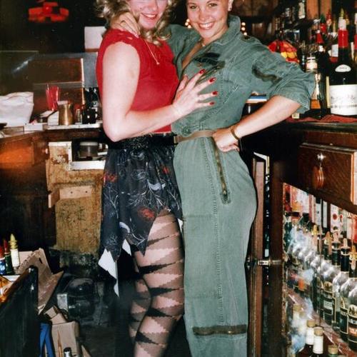 [Patty and Tudy behind the bar at Maude's on Halloween in 1987]