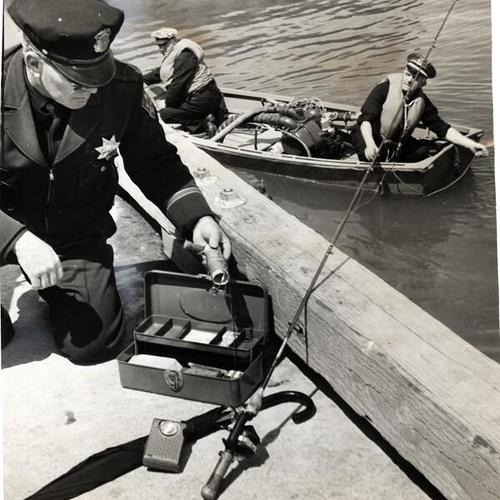 [Sergeant Patrick Shannon and two officers investigating the drowning of two teen-age boys]