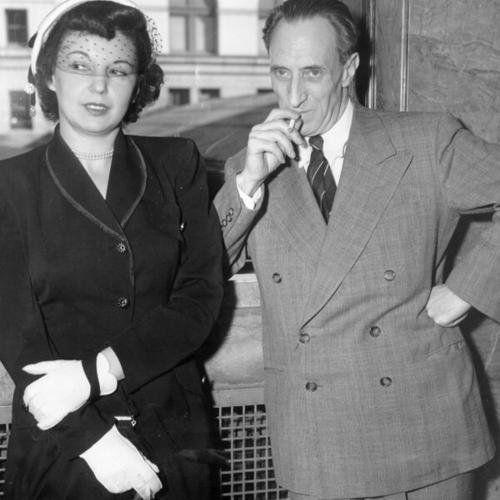 [Harry Bridges and his wife, nancy, relax with a cigaret after hearing sentence of five years in Federal Prison]