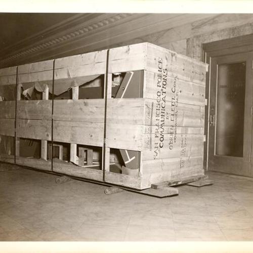 [New material is stored for the Communications Room upgrading in Old Hall of Justice]
