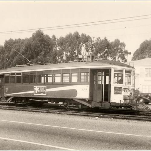 [Sloat boulevard between 29th and 30th avenues showing Motorman trainee John Gerrard Graham's #12 line car 944 on crossover]