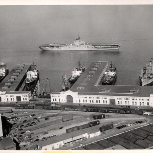 [Aircraft carrier USS Antietem passing Pier 34 at the San Francisco waterfront]