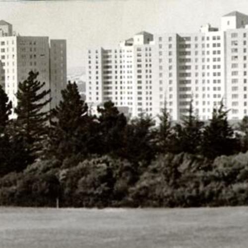 [View of Parkmerced apartment buildings from nearby golf course]