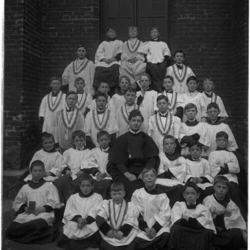 St. Mary's sanctuary society portrait of Father Stark and altar boys