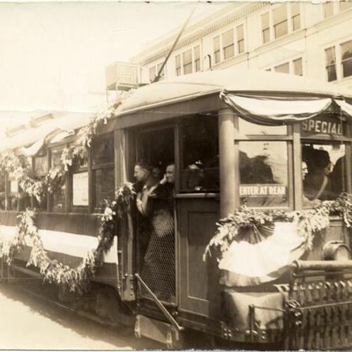 [Muni "A" Type car Special on Van Ness Avenue carrying 363d Infantry and 347th Artillery from City Hall to Presidio, April 22, 1919]