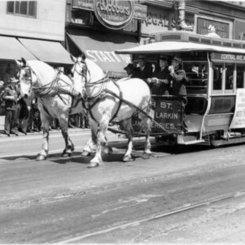 [Mayor Roger Lapham driving an old horse car in a Transportation Parade on Market Street]