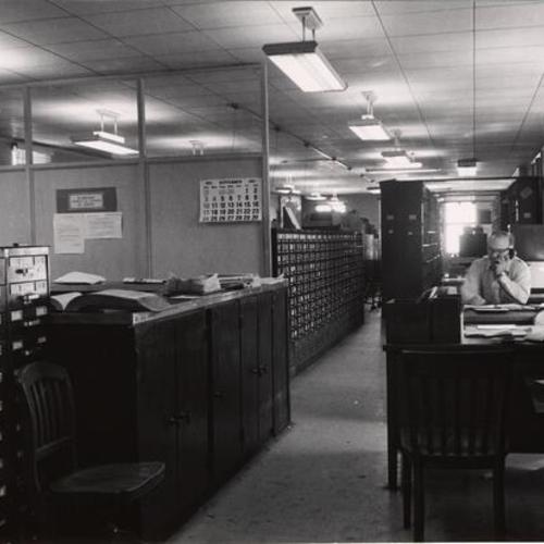 [Records room in Old Hall of Justice]