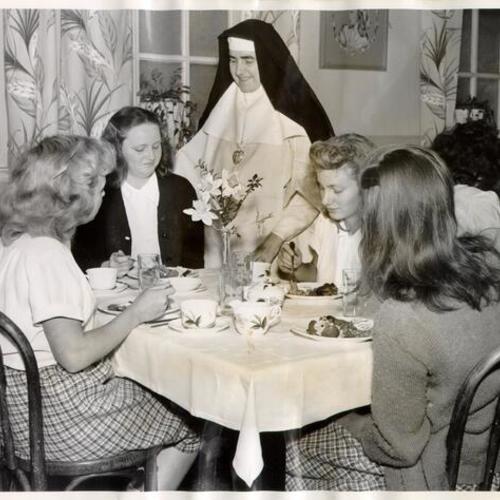[Girls eating dinner at the Home of the Good Shepherd]