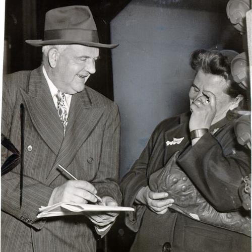 [Mayor Roger D. Lapham signing a petition for his own recall]