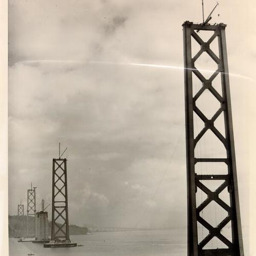 [View of messenger cable attached to San Francisco-Oakland Bay Bridge towers during construction]