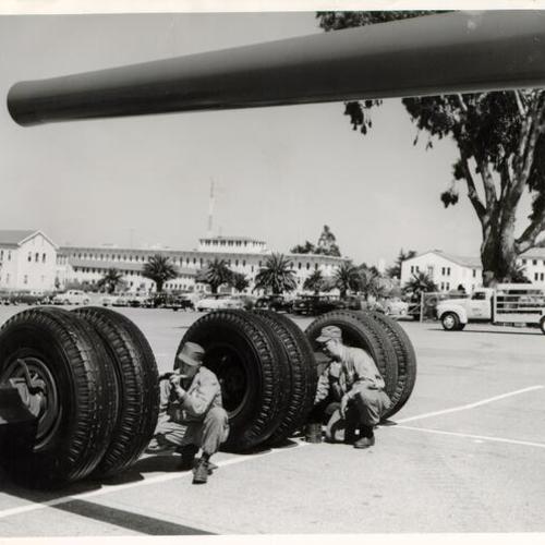 [Private Frank Urban and Private George Frederick making preparations for Armed Forces Day at the Presidio]